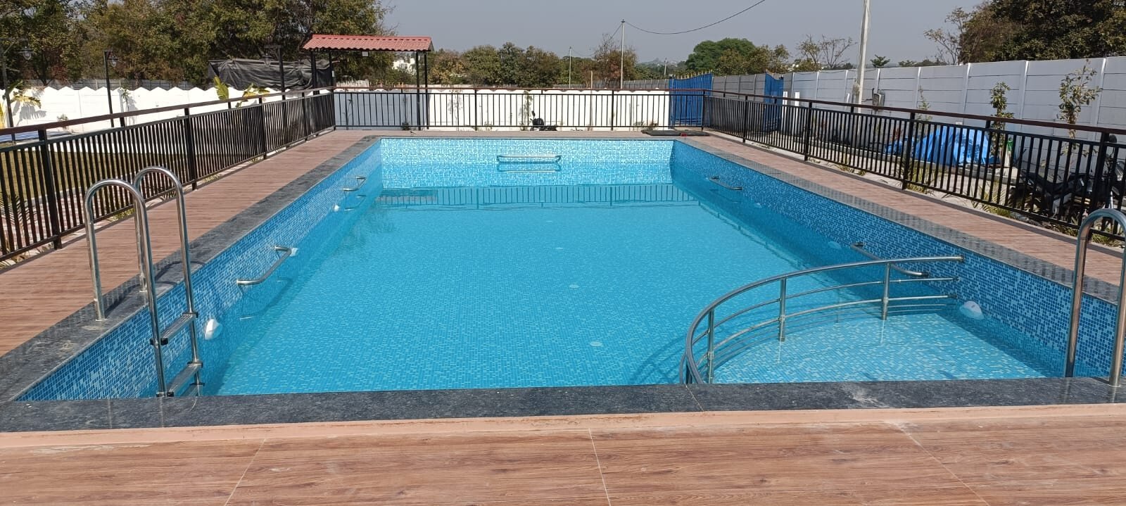 The private swimming pool at Aurelia Farmhouse, seen from the deck